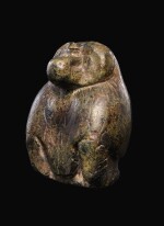 AN EGYPTIAN SERPENTINE FIGURE OF A BABOON, 26TH/30TH DYNASTY, 664-342 B.C.
