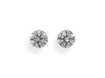 A Pair of 0.61 and 0.59 Carat Round Diamonds, G Color, VS2 and SI1 Clarity