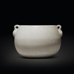 A straw-glazed pottery globular jar, Sui / early Tang dynasty | 隋 / 唐初 白釉雙耳罐