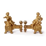A PAIR OF LOUIS XVI GILT-BRONZE CHENETS REPRESENTING LITERATURE AND SCULPTURE, THE MODEL ATTRIBUTED TO PHILIPPE CAFFIERI, CIRCA 1770