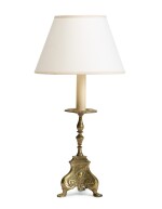 A carved brass candlestick, converted to lamp, second half 19th century