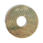 A green and russet jade bi disc, Warring States period / Western Han dynasty | 戰國 / 西漢 玉穀紋璧