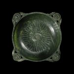 A Mughal-style spinach-green jade 'chrysanthemum' bowl, Qing dynasty, 19th century | 清十九世紀 碧玉雕痕都斯坦式花耳菊瓣洗