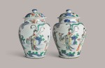 A pair of large wucai 'immortals' jars and covers Transitional period, circa 1640's | 明末清初 五彩瑤池神仙圖大蓋罐一對
