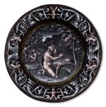 A Limoges grisaille painted enamel plate depicting Cupid fleeing from Psyche, Attributed to Pierre Reymond (1513-1584) circa 1570-1577
