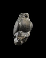 A Fragmentary Egyptian Basalt Figure of a Falcon, Late Period, probably 30th Dynasty, 380-342 B.C.
