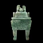 A large jadeite archaistic incense burner and cover, fangding | 翠玉仿古雙龍供壽雙獅鈕方鼎