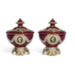 A pair of Chelsea claret-ground pot-pourri bowls and covers, circa 1765