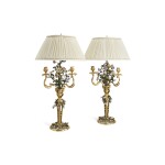 A PAIR OF LOUIS XV STYLE GILT BRONZE AND TOLE PEINTE CANDELABRA WITH POLYCHROME PORCELAIN FLOWERS, MOUNTED AS LAMPS