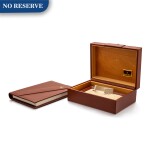 Rolex | A leather and wooden presentation box, Circa 1985
