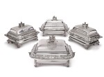 A SET OF FOUR GEORGE IV SILVER ENTRÉE DISHES AND COVERS ON SHEFFIELD-PLATED WARMING STANDS, JOHN BRIDGE, LONDON; THE BASES BY MATTHEW BOULTON PLATE CO., 1826