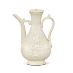 A Shufu white-glazed ‘prunus’ ewer, Yuan dynasty 元 樞府白釉印梅花執壺