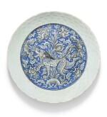 A SAFAVID BLUE AND WHITE POTTERY DISH DEPICTING A LION, PERSIA, 17TH CENTURY