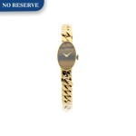 REFERENCE 5026/1 A LADY'S YELLOW GOLD BRACELET WATCH WITH TIGER EYE DIAL, CIRCA 1990’S