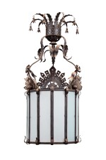 A tole and wrought iron three-light hall lantern, early 20th century | Lanterne à trois lumières en tôle et fer forgé, début XXe siècle