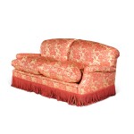 A red and gold floral damask sofa, modern, by David Laws