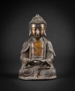 A parcel-gilt bronze seated Buddha Ming dynasty, 17th century | 明十七世紀 局部鎏金銅佛坐像