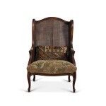 A Louis XV Style Beechwood Caned Wingback Armchair 
