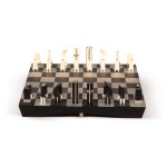 Rainer Facklam (born in 1960) , A wood, ebony and brushed inox chess set, 21th century | Rainer Facklam (né en 1960) Jeu d'échecs en bois, ébène et inox brossé, XXIe siècle