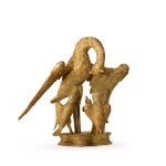 A North European Carved and Giltwood Group of a Bird and Three Chicks
