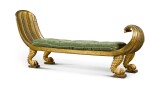A Regency parcel gilt and carved giltwood 'Egyptian Revival' daybed, circa 1815