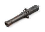 A patinated bronze barrel stock, early 18th century