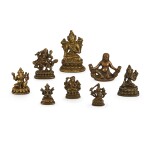 A GROUP OF EIGHT SMALL BRONZE BUDDHIST FIGURES TIBET, 13TH – 15TH CENTURY | 十三至十五世紀 藏傳佛教坐像一組八尊