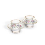 A pair of famille-rose trembleuse cups and saucers, Qing dynasty, 18th century
