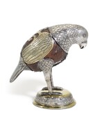 A continental parcel-gilt silver wood or coconut model of a bird, probably 18th century