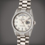 Reference 118389 Day-Date | A white gold and diamond-set automatic wristwatch with day, date, and bracelet, Circa 2000