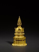 A magnificent and very rare Imperial gilt-copper stupa and gilt-copper alloy throne, The stupa Nepal, 15th century, The throne four-character mark and period of Qianlong | 尼泊爾 十五世紀 鎏金銅合金嵌寳石佛塔 配 清乾隆 鎏金銅座