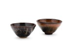 A Jian 'hare's-fur' bowl and a 'Jizhou' 'papercut' bowl Song dynasty | 宋 建窰兔毫紋盞及吉州窰黑釉剪紙貼花卉紋一組兩件