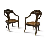 A pair of Regency simulated-coromandel 'Roman' open armchairs