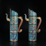 A pair of cloisonné enamel Tibetan-style 'dragon' ewers (Duomuhu), 17th century | 十七世紀 銅胎掐絲琺瑯海水趕珠龍紋多穆壺一對
