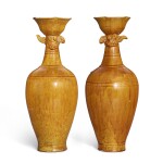 A rare pair of amber-glazed pottery phoenix-head flasks Liao dynasty | 遼 黃釉鳳首瓶一對