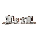 A silver and rosewood 5-piece tea and coffee-set, France, circa 1930 | Service à thé et café de 5 pièces en argent et palissandre de Rio, France, vers 1930