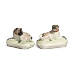 A PAIR OF BOW FIGURES OF PUGS CIRCA 1750