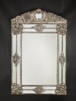 A silver-mounted pier mirror, the silver French or Flemish, late 17th century, the supporting frame English, circa 1820