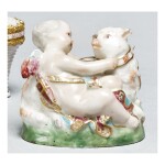  A CHELSEA PORCELAIN BONBONNIERE IN THE FORM OF CUPID WITH A SHEEP CIRCA 1760  