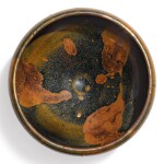 A russet-splashed black-glazed bowl, Yuan dynasty | 元 黑釉鐵鏽花紋盌