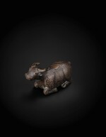 A finely cast gold and silver inlaid archaistic 'recumbent buffalo' waterpot Yuan Dynasty -Ming Dynasty, 13th-15th century | 元至明 十三至十五世紀 銅錯金銀臥牛水注