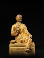 A gilt-bronze figure of the Luohan Vajriputra, Qing dynasty, Qianlong period