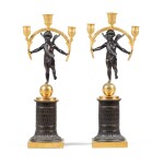 A pair of patinated and gilt-bronze candelabra, French Restauration, circa 1830 