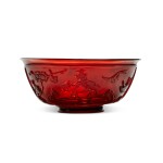 A transparent ruby-red 'landscape' bowl late 19th/20th Century | 十九世紀末/二十世紀 紅料踏春圖碗