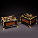 A pair of Italian gilt-bronze mounted pietre dure, ebony and kingwood caskets, Florence, Granducal Workshops, second quarter 18th century, after designs by Gianbattista Foggini, the panels circa 1720