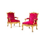A pair of early George III giltwood armchairs, designed by Robert Adam and made by Thomas Chippendale, 1765