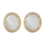 A PAIR OF GEORGE III GILTWOOD OVAL PIER MIRRORS, LAST QUARTER 18TH CENTURY