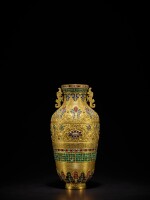 A rare paste-inset gilt-bronze repoussé vase, Qing dynasty, Qianlong period | 清乾隆 銅鎏金鏨花嵌料龍耳瓶