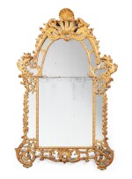 A giltwood mirror, French Régence, circa 1720 |  Miroir à parecloses en bois doré d'époque Régence, vers 1720