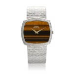 PIAGET | REF 12731 A6, WHITE GOLD BRACELET WATCH WITH TIGER'S EYE DIAL CIRCA 1990